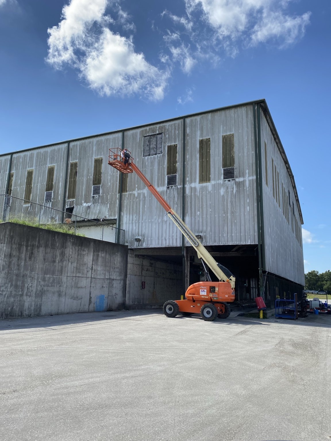 Exterior cleaning with boom lift access